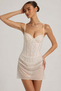 Semi-Sheer Embellished Draped Corset Mini Dress in White – view 1